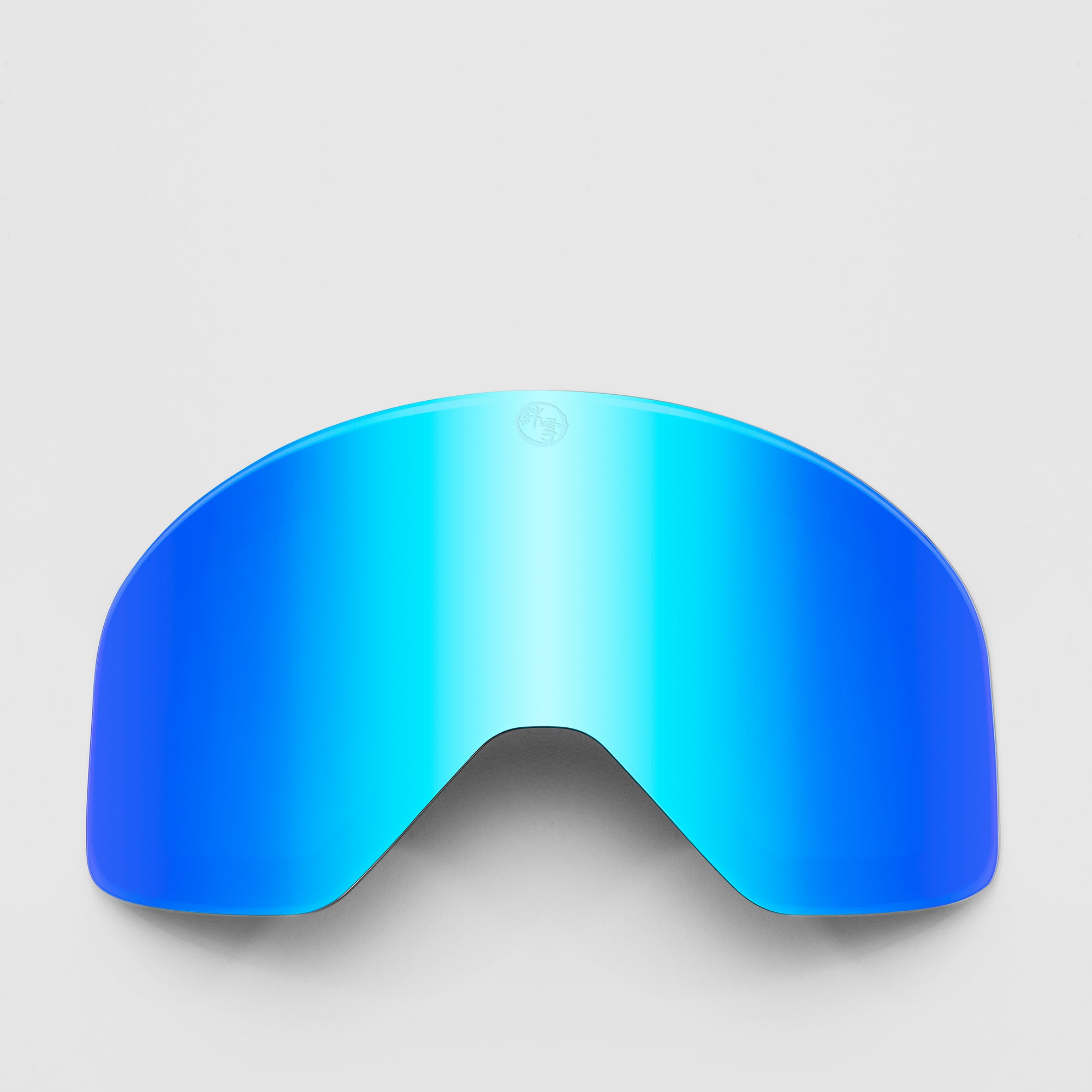Blue ski goggles lens on a light gray background