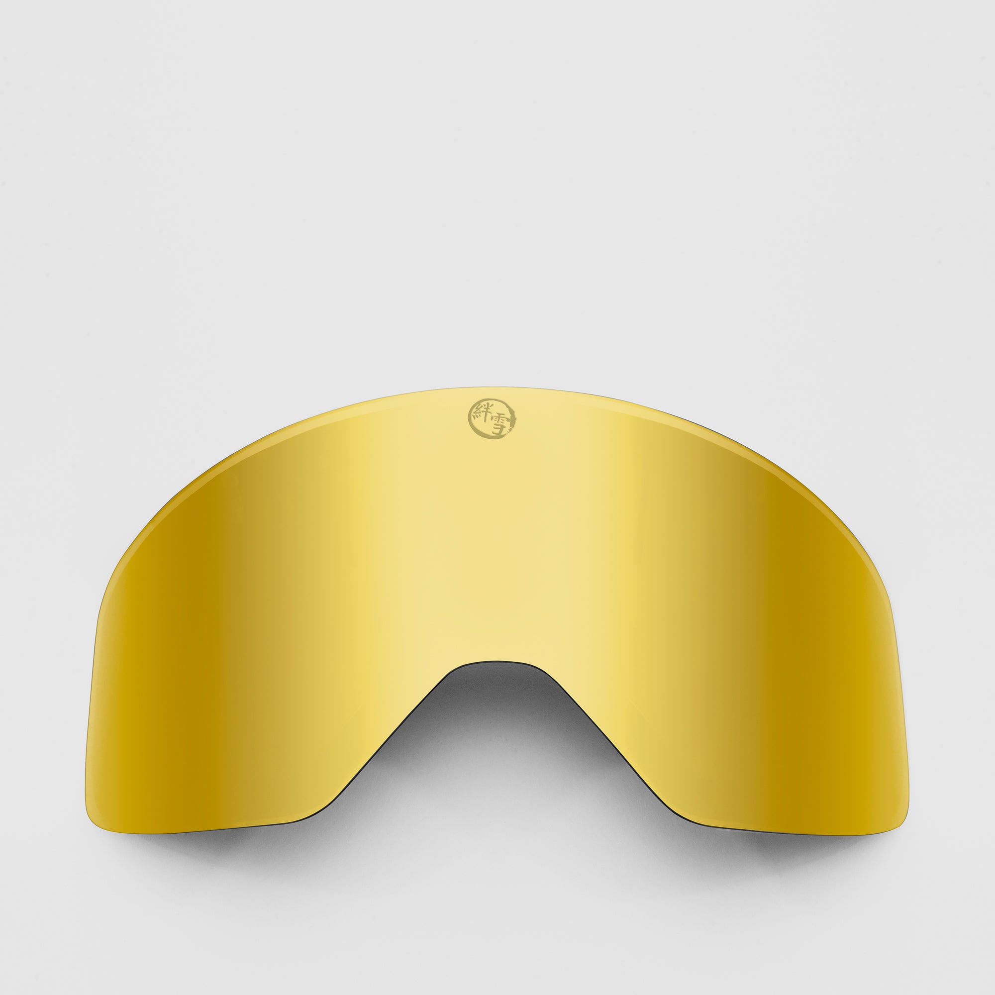 Gold ski, slim goggles lens on a light gray background