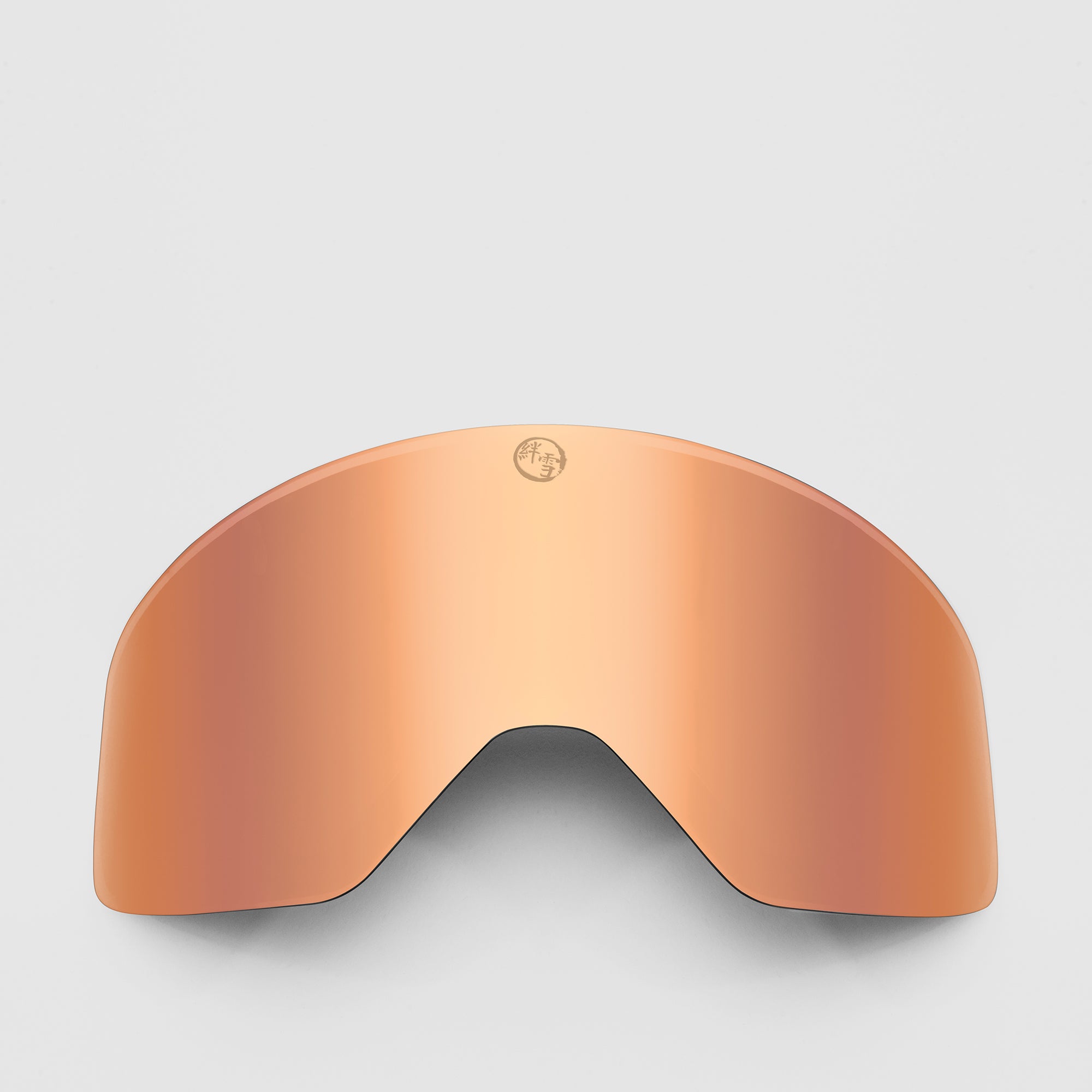 Rose gold, slim ski goggles lens on a light gray background