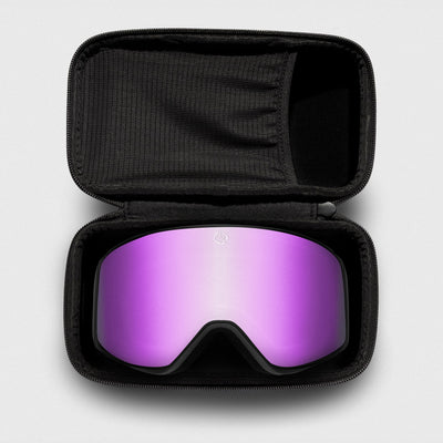 Pink, slim reflective ski goggles, with black frame in a black case on a light gray background