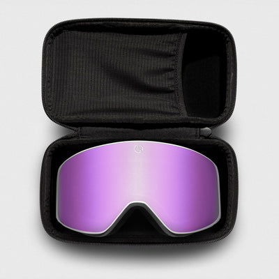 Pink, slim reflective ski goggles, with white frame in a black case on a light gray background