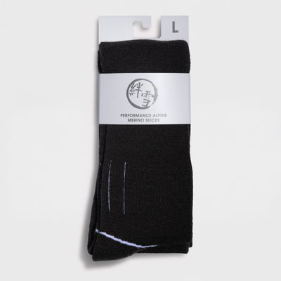 Black ski socks called Performance Alpine Merino socks in Large size on a light gray background