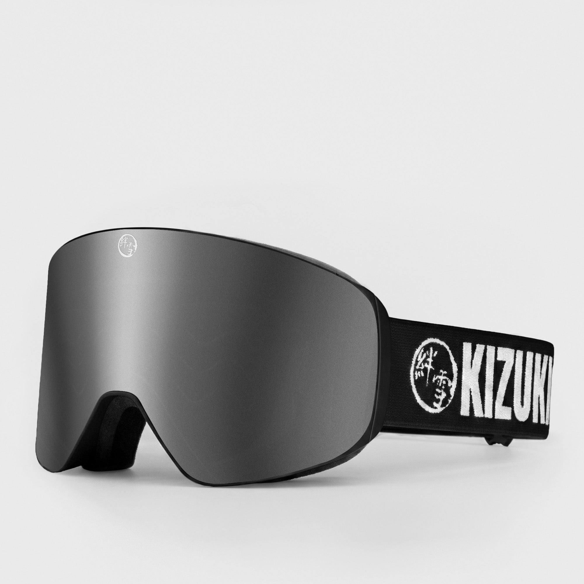 Grey ski goggle in standard size with black strap featuring 'KIZUKI' brand on a light gray background