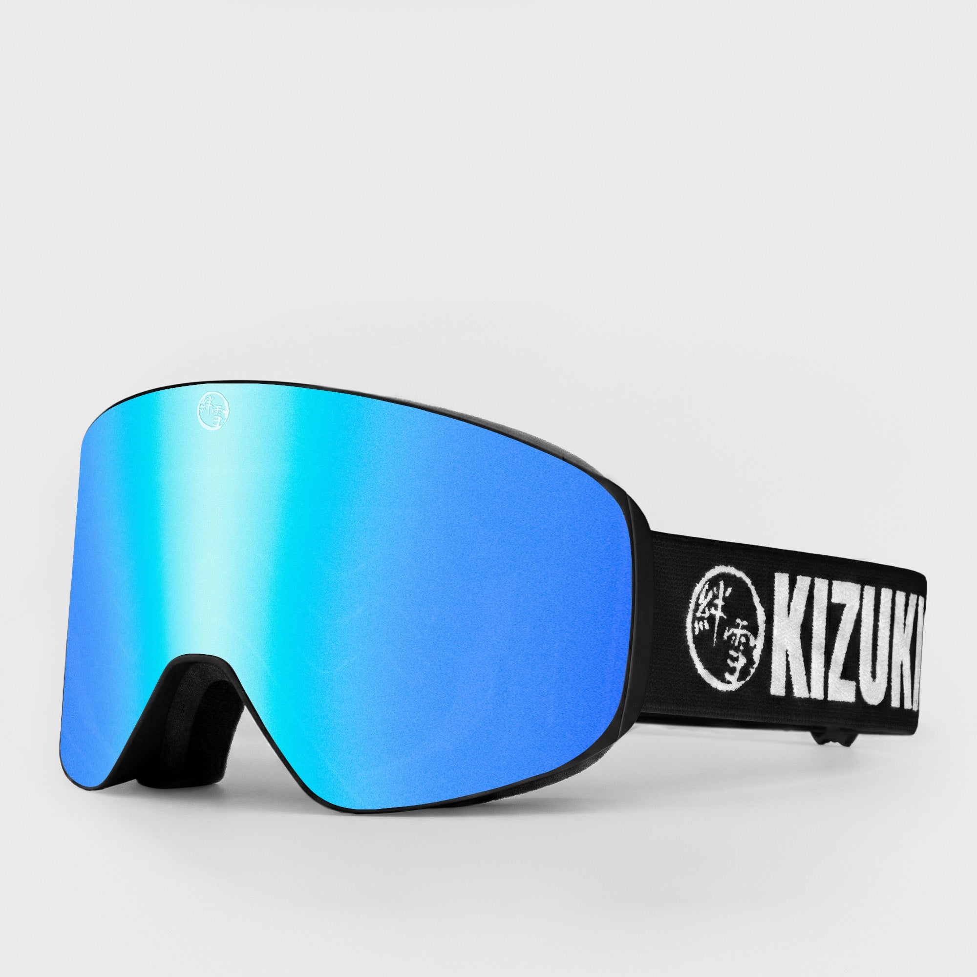Blue ski goggle in standard size with black strap featuring 'KIZUKI' brand on a light gray background