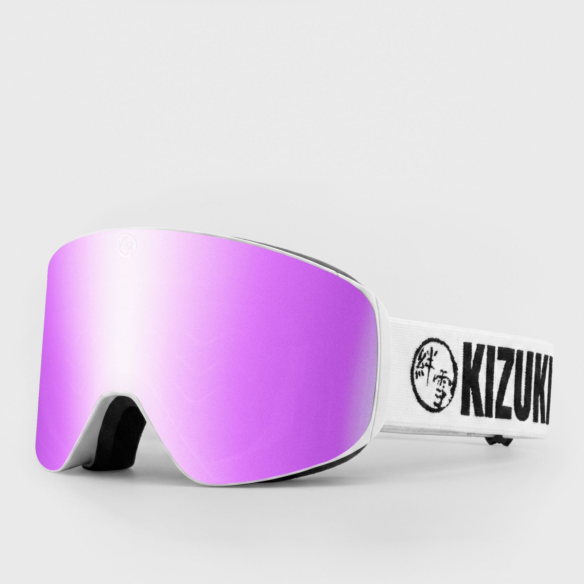 Pink ski goggle in standard size with white strap featuring 'KIZUKI' brand on a light gray background