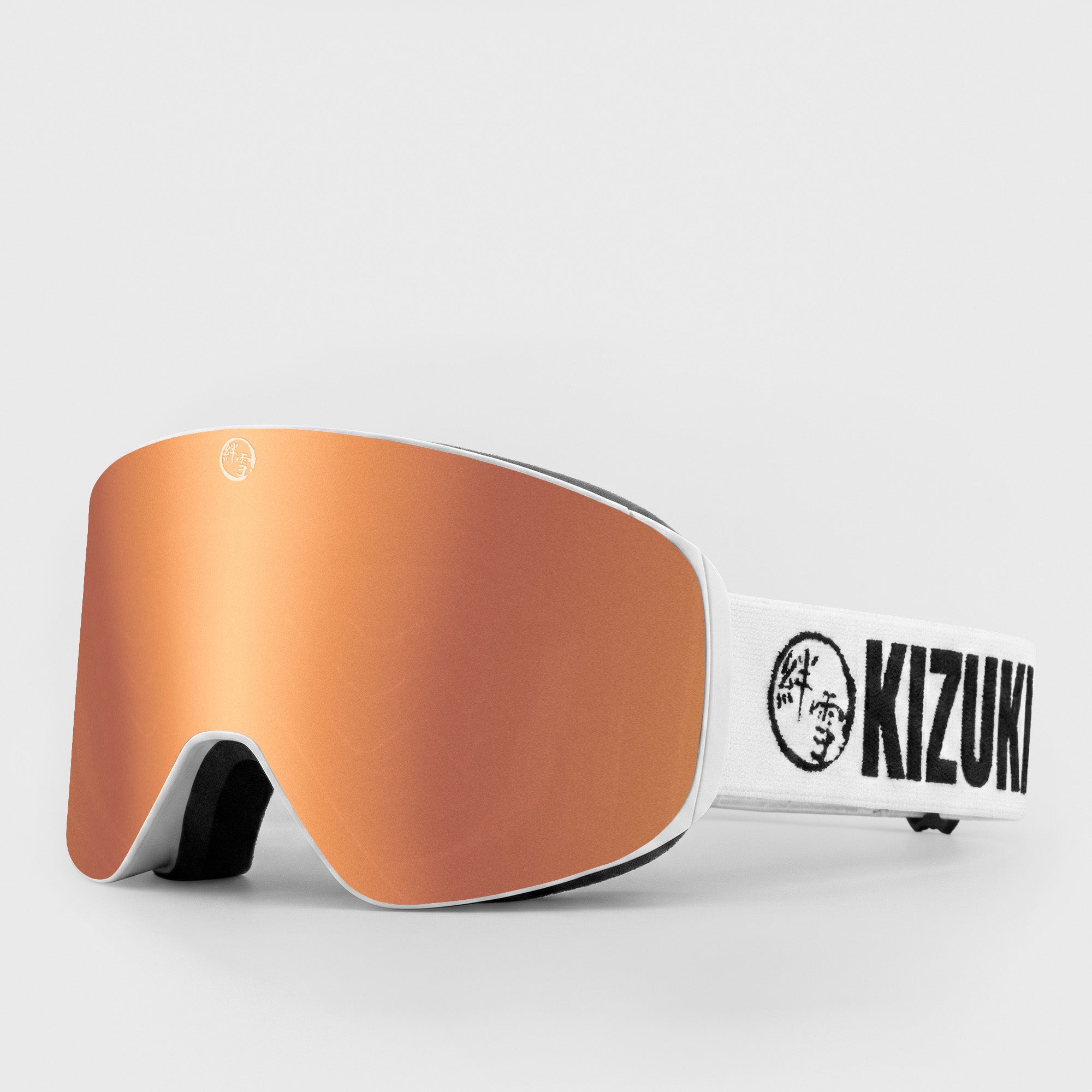 Rose gold ski goggle in standard size with white strap featuring 'KIZUKI' brand on a light gray background