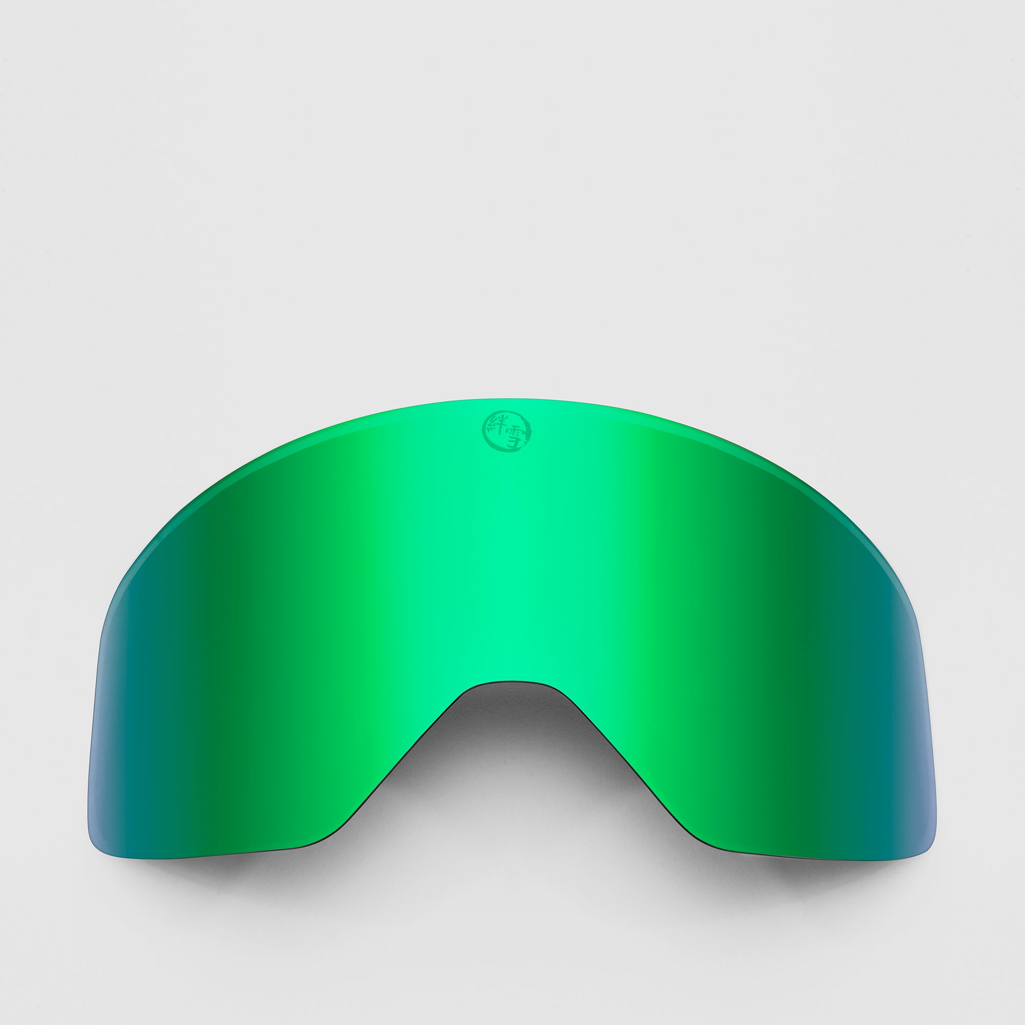 Green, slim ski goggles lens on a light gray background